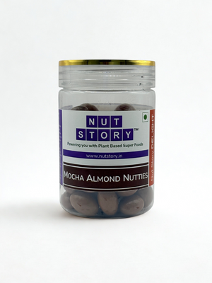 Close-up of Nut Story Mocha Almond Nutties showing silky chocolate coating and roasted almond centre